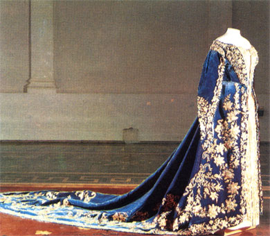 Embroidery worked with gilt spangles and threads on dark blue velvet and white satin. Court dress, open: bodice, skirt, train. Late 19th century