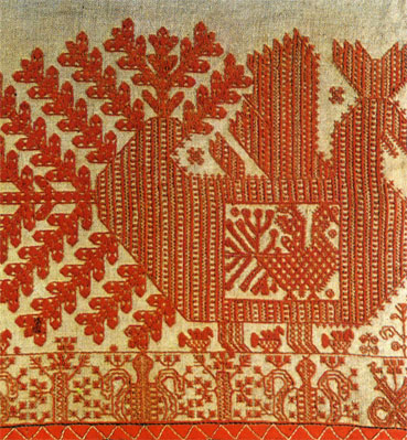 Embroidery worked in counted stitches: oblique and satin stitches with red cotton thread on linen. Detail of a valance. Second half, 19th century