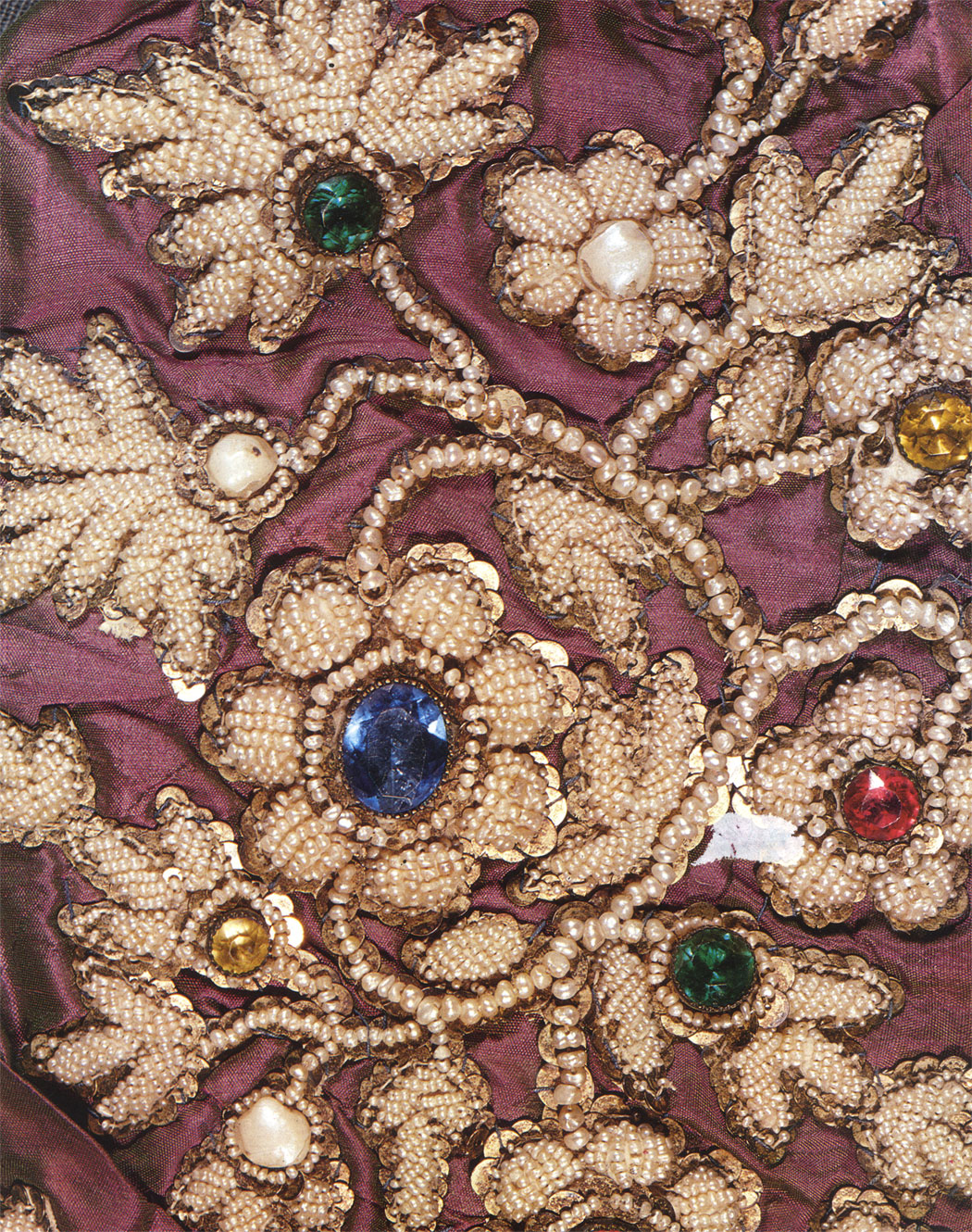 Embroidery worked in river pearls, spangles, mother-of-pearls, glass sockets, plates