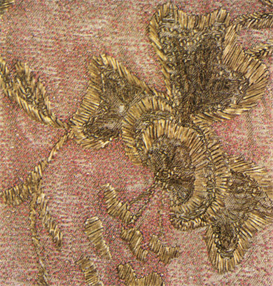 Embroidery worked with cotton thread, bugles, beads and gilt thread on silk tulle. Detail of a dress. Early 20th century