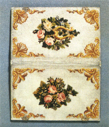 Embroidery worked with coloured silks in half-cross stitch on metal canvas. Wallet. First quarter, 19th century